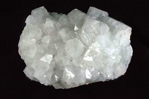 White Apophyllite Cluster with natural sediment, $79, Mystical Earth Gallery
