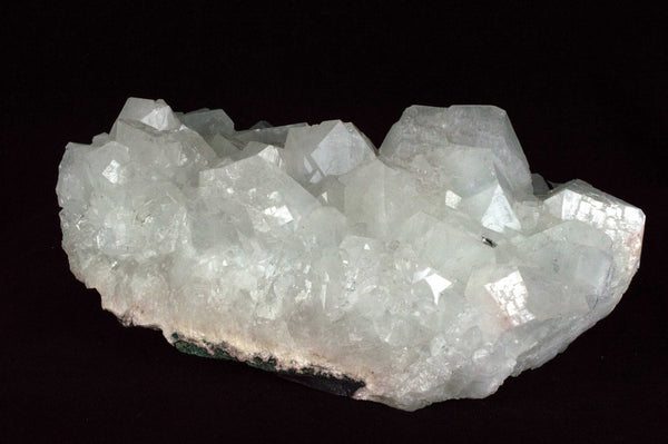 White Apophyllite Cluster with natural sediment, $79, Mystical Earth Gallery