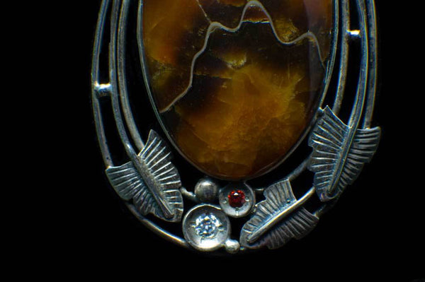 Alena Zena Simbercite Shield with Citrine & Cubic Zirconia Pendant for $199 at Mystical Earth Gallery (Close Up Silverwork View)