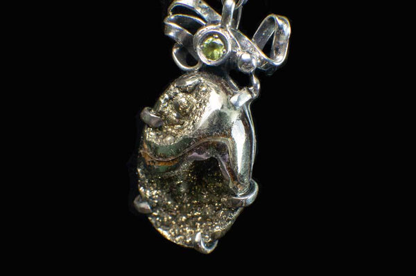 Alena Zena Pyritized Trilobite with Peridot Pendant for $219 at Mystical Earth Gallery (Close Up Side View #2)