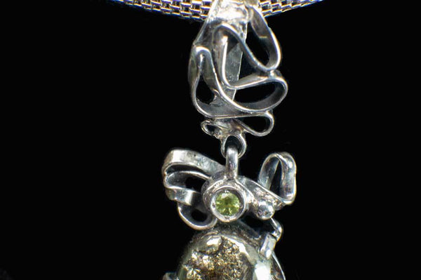 Alena Zena Pyritized Trilobite with Peridot Pendant for $219 at Mystical Earth Gallery (Close Up Bale View)