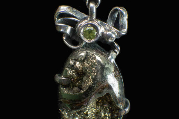 Alena Zena Pyritized Trilobite with Peridot Pendant for $219 at Mystical Earth Gallery (Close Up Peridot View)