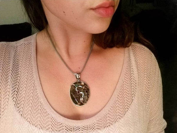 Alena Zena Simbercite with Pyrite Cubes Pendant (Photo of pendant on Model) for $299  at Mystical Earth Gallery