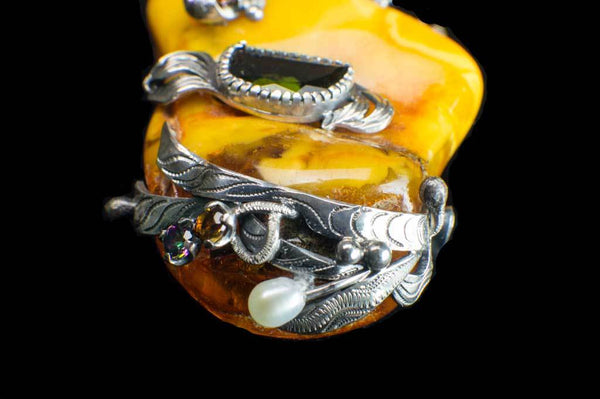 Alena Zena Baltic Butterscotch Amber with Australian Blue Opal & Green Tourmaline Pendant for $899 at Mystical Earth Gallery (Close Up View of Silverwork on Green Tourmaline Side)