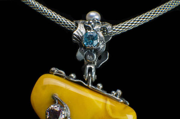 Alena Zena Baltic Butterscotch Amber with Australian Blue Opal & Green Tourmaline Pendant for $899 at Mystical Earth Gallery (Close Up View of Top Half Opal Side))